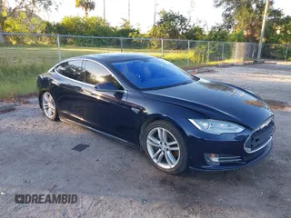 2013 Tesla Model S with VIN 5YJSA1DN9DFP06165, listed as a IAAI auction lot 40920844 with 181,342 mi miles. Bid and sale history available at carsss.com. Image 1.