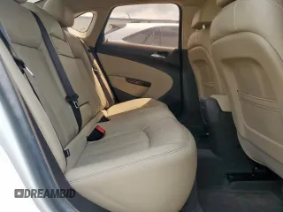 2013 Buick Verano Group z VIN 1G4PS5SK1D4233643, wystawiony jako Copart lot #54304015 z przebiegiem 103 566 mil mil oraz Czysty tytuł • Clean title. Historia ofert i sprzedaży dostępna na DreamBid. Obrazek 10.