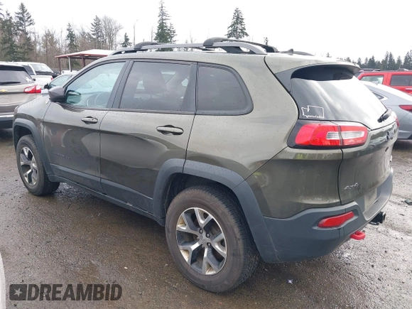 2015 Jeep Cherokee Trailhawk with VIN 1C4PJMBB5FW510514, listed as a IAAI auction lot 41492111 with 98,482 mi miles and . Bid and sale history available at DreamBid. Image 15.