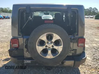 2017 Jeep Wrangler Sahara z VIN 1C4AJWBG1HL669600, wystawiony jako Copart lot #52856865 z przebiegiem 85 311 mil mil oraz Szkoda całkowita • Salvage title. Historia ofert i sprzedaży dostępna na DreamBid. Obrazek 6.