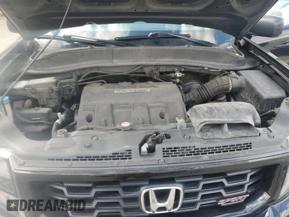 2014 Honda Ridgeline Sport z VIN 5FPYK1F76EB011060, wystawiony jako Copart lot #51876545 z przebiegiem 246 376 mil mil oraz Szkoda całkowita • Salvage title. Historia ofert i sprzedaży dostępna na DreamBid. Obrazek 11.