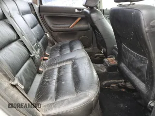 2000 Volkswagen Passat z VIN WVWRH23B6YE274455, wystawiony jako Copart lot #81634704 z przebiegiem 154 076 mil mil oraz Czysty tytuł • Clean title. Historia ofert i sprzedaży dostępna na DreamBid. Obrazek 11.