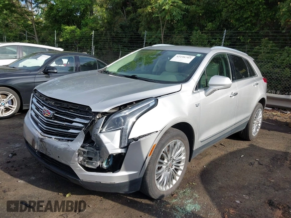 2017 Cadillac XT5 Luxury FWD z VIN 1GYKNBRS8HZ265955, wystawiony jako IAAI lot #42198769 z przebiegiem 125 086 mil mil oraz . Historia ofert i sprzedaży dostępna na DreamBid. Obrazek 17.