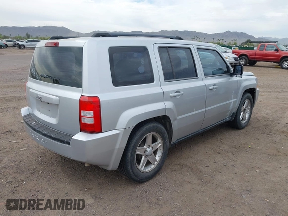 2010 Jeep Patriot Sport with VIN 1J4NT2GB7AD529286, listed as a IAAI auction lot 42020227 with 158,401 mi miles. Bid and sale history available at carsss.com. Image 4.