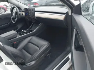 2021 Tesla Model Y Standard Range with VIN 5YJYGDED3MF103499, listed as a IAAI auction lot 41632064 with 132,846 mi miles and . Bid and sale history available at DreamBid. Image 5.
