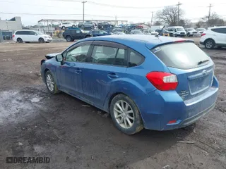 2014 Subaru Impreza Wagon 2.0i Premium with VIN JF1GPAC65E8261560, listed as a IAAI auction lot 41777852 with 145,880 mi miles. Bid and sale history available at carsss.com. Image 3.