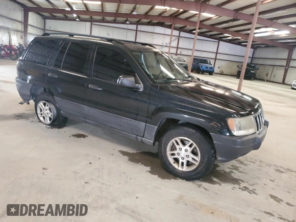 2003 Jeep Grand Cherokee Laredo with VIN 1J4GX48S13C601387, listed as a Copart auction lot 60544295 with 217,485 mi miles and Salvage title. Bid and sale history available at DreamBid. Image 4.