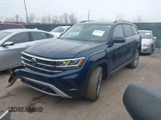 2021 Volkswagen Atlas SEL with VIN 1V2BR2CA8MC505723, listed as a IAAI auction lot 41423187 with 55,890 mi miles and . Bid and sale history available at DreamBid. Image 2.