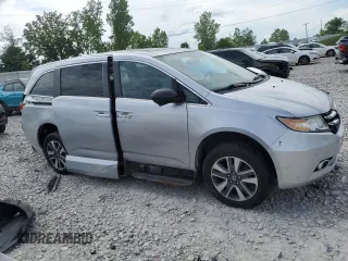 2015 Honda Odyssey Touring Elite z VIN 5FNRL5H93FB041067, wystawiony jako Copart lot #58329355 z przebiegiem 72 000 mil mil oraz Szkoda całkowita • Salvage title. Historia ofert i sprzedaży dostępna na DreamBid. Obrazek 4.