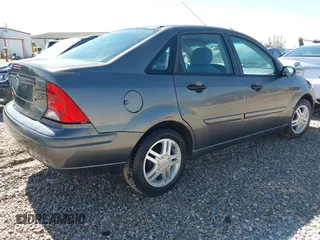 2004 Ford Focus SE with VIN 1FAFP34394W152606, listed as a IAAI auction lot 41833454 with 287,290 mi miles and . Bid and sale history available at DreamBid. Image 4.