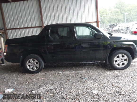 2007 Honda Ridgeline RTL with VIN 2HJYK16547H549241, listed as a IAAI auction lot 42282477 with 214,685 mi miles and . Bid and sale history available at DreamBid. Image 13.