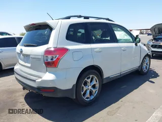 2015 Subaru Forester Touring with VIN JF2SJAWC8FH588321, listed as a IAAI auction lot 42689364 with 103,642 mi miles and . Bid and sale history available at DreamBid. Image 4.