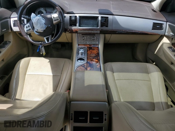 2009 Jaguar XF with VIN SAJXA06B79HR44382, listed as a Copart auction lot 53041205 with 121,245 mi miles and Salvage Title. Bid and sale history available at DreamBid. Image 8.