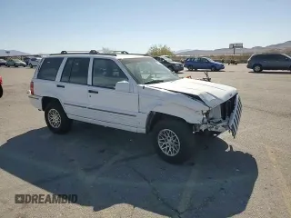 1995 Jeep Grand Cherokee Limited with VIN 1J4GZ78Y3SC701103, listed as a Copart auction lot 72038184 with 143,829 mi miles and Salvage Title. Bid and sale history available at carsss.com. Image 12.
