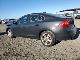 2015 Volvo S60 T5 Drive-E Premier Plus with VIN YV126MFC0F1313708, listed as a Copart auction lot 88606785 with 56,884 mi miles and Salvage Title. Bid and sale history available at carsss.com. Image 2.
