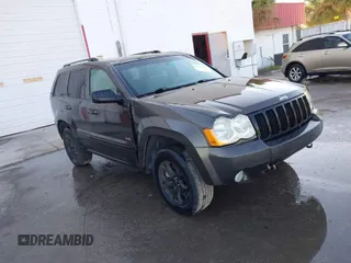 2006 Jeep Grand Cherokee Laredo with VIN 1J4HS48N76C357892, listed as a IAAI auction lot 41767752 with 142,734 mi miles. Bid and sale history available at carsss.com. Image 1.