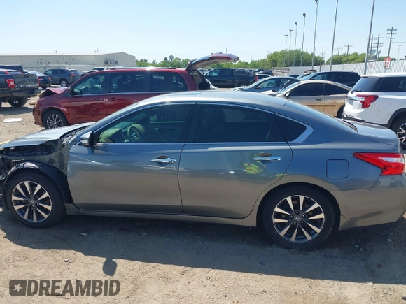 2016 Nissan Altima SR z VIN 1N4AL3AP5GC121498, wystawiony jako IAAI lot #41965883 z przebiegiem 128 381 mil mil oraz . Historia ofert i sprzedaży dostępna na DreamBid. Obrazek 15.