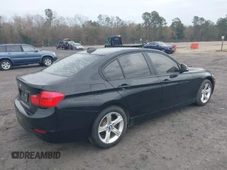 2015 BMW 3 Series 328i with VIN WBA3A5C5XFF608822, listed as a IAAI auction lot 41439719 with 71,830 mi miles. Bid and sale history available at carsss.com. Image 4.