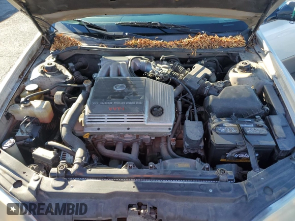 1999 Lexus ES 300 z VIN JT8BF28G4X5060914, wystawiony jako Copart lot #45912725 z przebiegiem 197 401 mil mil oraz Szkoda całkowita • Salvage title. Historia ofert i sprzedaży dostępna na DreamBid. Obrazek 11.