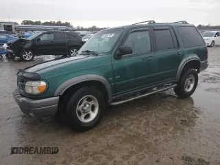 2000 Ford Explorer XLT z VIN 1FMDU83PXYZB03135, wystawiony jako Copart lot #45352705 z przebiegiem 228 604 mil mil oraz Szkody całkowita. Historia ofert i sprzedaży dostępna na DreamBid. Obrazek 1.