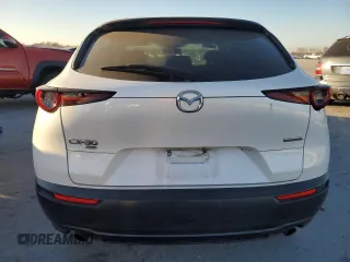 2020 Mazda CX-30 Select with VIN 3MVDMBCL1LM115794, listed as a Copart auction lot 83878064 with 82,185 mi miles and Salvage Title. Bid and sale history available at carsss.com. Image 6.