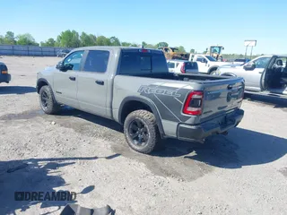 2023 Ram 1500 Rebel with VIN 1C6SRFLT2PN677577, listed as a IAAI auction lot 41991668 with 20,507 mi miles and . Bid and sale history available at DreamBid. Image 3.