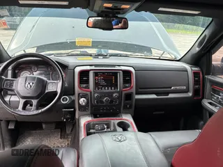 2016 Ram 1500 Rebel z VIN 1C6RR7YT2GS171455, wystawiony jako Copart lot #54708635 z przebiegiem 150 421 mil mil oraz Tytuł czysty. Historia ofert i sprzedaży dostępna na DreamBid. Obrazek 9.