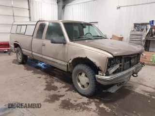 1996 GMC Sierra 1500 z VIN 1GTEK19R9TE551316, wystawiony jako IAAI lot #41565185 z przebiegiem 357 598 mil mil oraz . Historia ofert i sprzedaży dostępna na DreamBid. Obrazek 1.