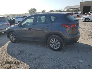 2016 Mazda CX-5 Sport with VIN JM3KE2BE7G0739544, listed as a Copart auction lot 75557244 with 128,336 mi miles and Salvage Title. Bid and sale history available at DreamBid. Image 2.