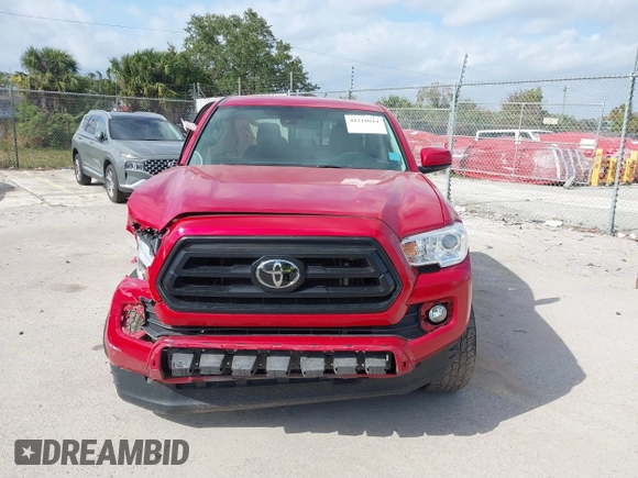 2022 Toyota Tacoma SR with VIN 3TYAX5GN1NT039848, listed as a IAAI auction lot 41210811 with 93,670 mi miles and . Bid and sale history available at DreamBid. Image 12.