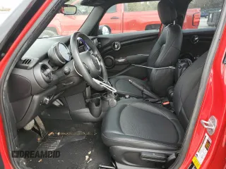2021 MINI Hardtop 4 Door Oxford Edition z VIN WMWXU7C08M2N49721, wystawiony jako Copart lot #77983324 z przebiegiem 64 096 mil mil oraz Szkoda całkowita • Salvage title. Historia ofert i sprzedaży dostępna na DreamBid. Obrazek 7.