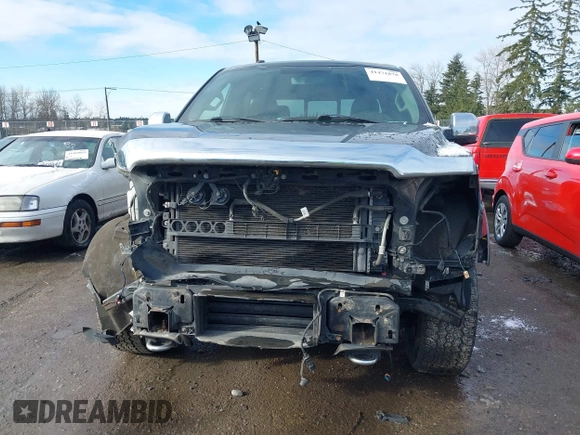 2015 Ford F-150 XLT with VIN 1FTEW1EP4FFB51252, listed as a IAAI auction lot 41471878 with 103,393 mi miles. Bid and sale history available at carsss.com. Image 13.