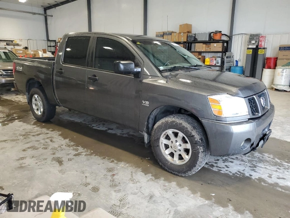 2004 Nissan Titan LE with VIN 1N6AA07B74N507976, listed as a Copart auction lot 56402785 with 181,253 mi miles and Salvage title. Bid and sale history available at DreamBid. Image 4.