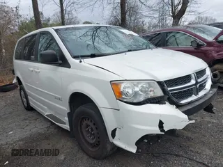 2012 Dodge Grand Caravan SE with VIN 2C4RDGBG9CR232038, listed as a IAAI auction lot 41823766 with 77,468 mi miles and . Bid and sale history available at DreamBid. Image 1.