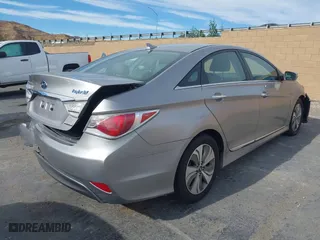 2013 Hyundai Sonata Hybrid with VIN KMHEC4A42DA089524, listed as a IAAI auction lot 41233221 with 114,636 mi miles. Bid and sale history available at carsss.com. Image 4.
