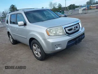 2009 Honda Pilot EX-L with VIN 5FNYF48559B034121, listed as a IAAI auction lot 41928138 with 193,969 mi miles. Bid and sale history available at carsss.com. Image 1.