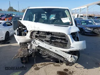 2018 Ford Transit with VIN 1FTYR1ZM2JKA64616, listed as a IAAI auction lot 41707538 with 221,167 mi miles and . Bid and sale history available at DreamBid. Image 13.