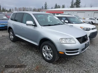 2006 Volkswagen Touareg 4.2L V8 with VIN WVGZM77L06D043948, listed as a IAAI auction lot 41839431 with 207,496 mi miles and . Bid and sale history available at DreamBid. Image 1.