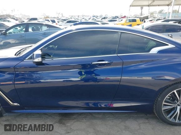 2021 Infiniti Q60 Luxe with VIN JN1EV7KK7MM411041, listed as a IAAI auction lot 42047041 with 26,562 mi miles and . Bid and sale history available at DreamBid. Image 14.