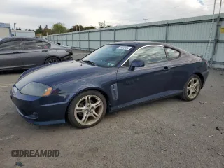 2005 Hyundai Tiburon GT z VIN KMHHN65F95U159244, wystawiony jako Copart lot #76318134 z przebiegiem 78 324 mil mil oraz Tytuł czysty. Historia ofert i sprzedaży dostępna na DreamBid. Obrazek 1.