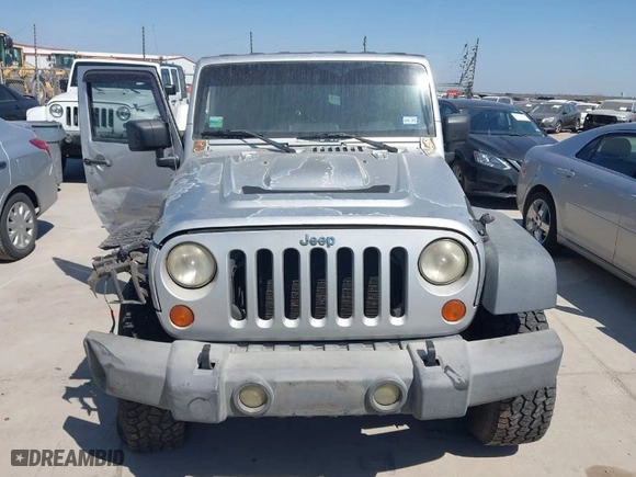2007 Jeep Wrangler Unlimited X with VIN 1J4GA39197L161975, listed as a IAAI auction lot 41742409 with 270,227 mi miles. Bid and sale history available at carsss.com. Image 12.