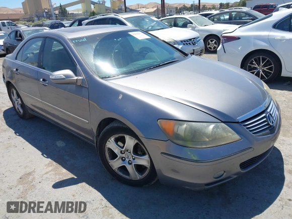 2005 Acura RL z VIN JH4KB16565C002626, wystawiony jako IAAI lot #42522273 z przebiegiem 293 980 mil mil oraz . Historia ofert i sprzedaży dostępna na DreamBid. Obrazek 1.