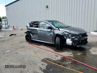 2018 Nissan Sentra SV z VIN 3N1AB7AP9JY281986, wystawiony jako Copart lot #56229955 z przebiegiem 126 585 mil mil oraz Nie do naprawy • Non repairable. Historia ofert i sprzedaży dostępna na DreamBid. Obrazek 14.
