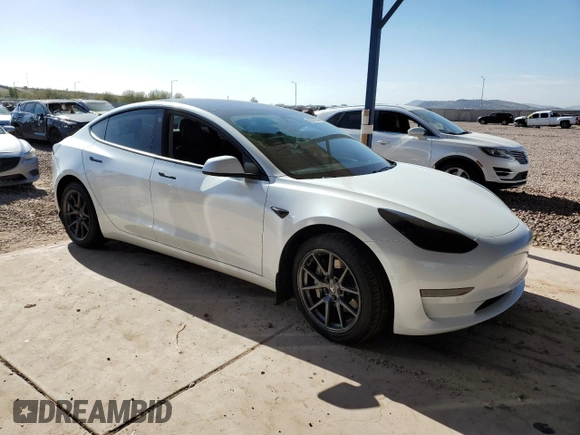 2021 Tesla Model 3 Standard Range Plus with VIN 5YJ3E1EA7MF978749, listed as a Copart auction lot 43377955 with 51,871 mi miles and Salvage Title. Bid and sale history available at carsss.com. Image 4.