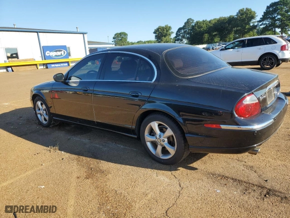 2004 Jaguar S-Type with VIN SAJEA01T04FN08520, listed as a Copart auction lot 58475964 with 67,744 mi miles and Salvage Title. Bid and sale history available at carsss.com. Image 2.