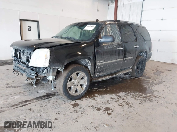 2011 GMC Yukon Denali with VIN 1GKS2EEF2BR258374, listed as a IAAI auction lot 41653820 with 227,468 mi miles. Bid and sale history available at carsss.com. Image 2.