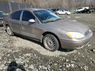 2004 Ford Taurus SE with VIN 1FAFP53U34A104053, listed as a Copart auction lot 47086045 with Not Provided miles and Salvage Title. Bid and sale history available at DreamBid. Image 4.