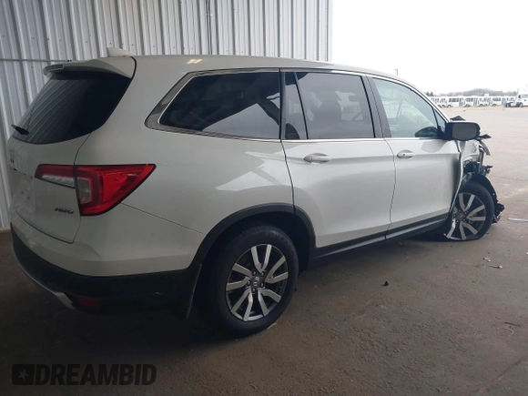 2022 Honda Pilot EX-L with VIN 5FNYF6H58NB097283, listed as a IAAI auction lot 40944566 with 22,027 mi miles and . Bid and sale history available at DreamBid. Image 4.