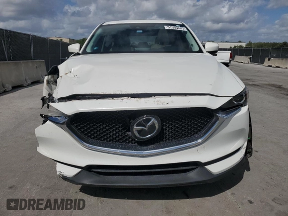 2019 Mazda CX-5 Touring with VIN JM3KFACM5K0693931, listed as a Copart auction lot 51599685 with 51,907 mi miles and Non Repairable. Bid and sale history available at carsss.com. Image 5.