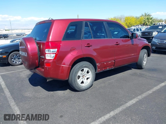 2008 Suzuki Grand Vitara w/Spare & Cargo Covers z VIN JS3TD941084101215, wystawiony jako IAAI lot #42154547 z przebiegiem 141 851 mil mil oraz . Historia ofert i sprzedaży dostępna na DreamBid. Obrazek 4.